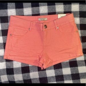 Coral short shorts. New with tags.  Size small.